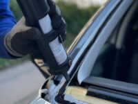 a person holding a bottle